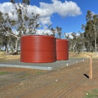 Rainwater Tanks in Heritage Red Installed by Clark Tanks